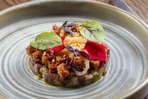 Venison Tartare with Croutons and Micro Herbs Venison Tartare with Croutons and Micro Herbs